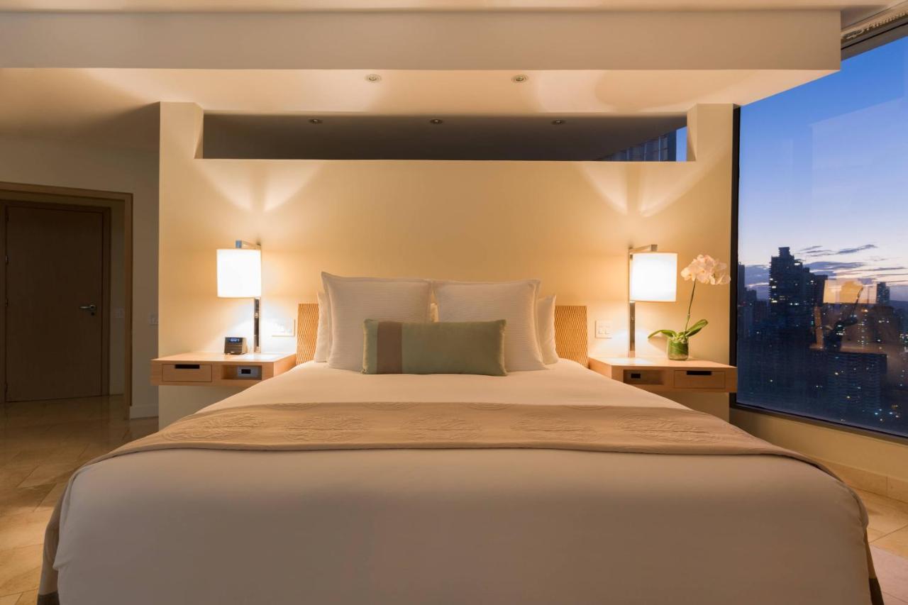 JW Marriott Panama Hotell Exteriör bild A bedroom at the Mandarin Oriental, New York